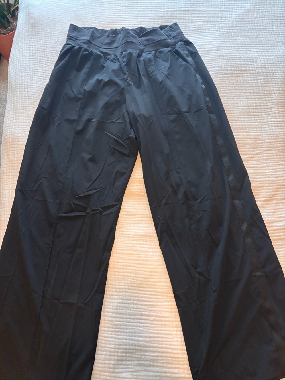 Athleta Black Wide-Leg Performance Pants with tuxedo stripe